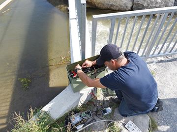 Christopher Bunt, CEO of Biotactic Fish and Wildlife Research, tested a camera system to record data for counting and identifying fish moving through the Bowmanville fish ladder. September 24, 2015.